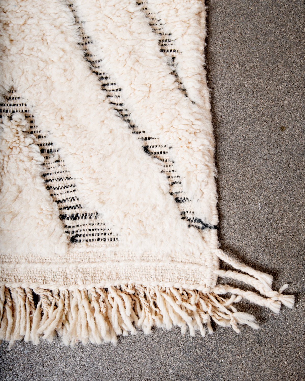 Modern, designer, handcrafted Berber rug from Morocco. Beniourain carpet with beautiful colours and patterns and fluffy wool texture.